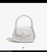 White acrylic sling bag with golden chain handle - Small, fashionable crossbody for women. Made in India